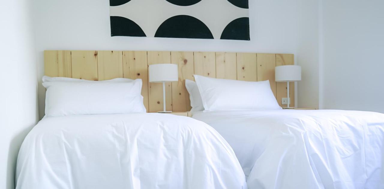 Casagrande Hotel & Beach Club José Ignacio Exteriér fotografie A bed with white sheets
