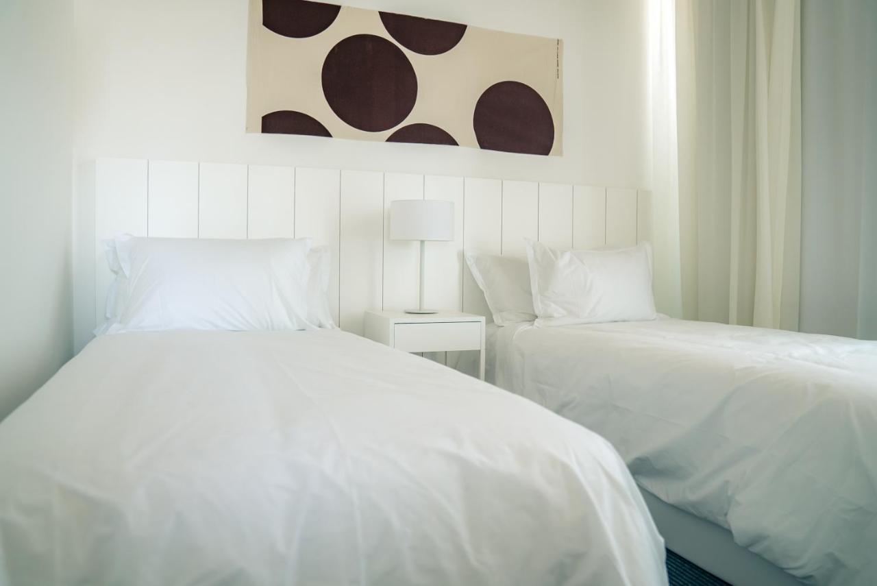 Casagrande Hotel & Beach Club José Ignacio Exteriér fotografie A bedroom with two single beds